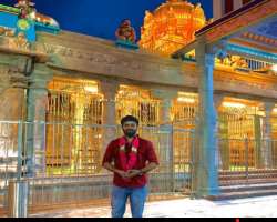 He is a religious person and often goes to temple to get blessings.